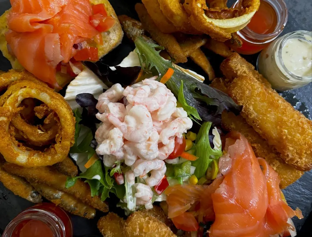 Food arranged for sharing at Tanskeys